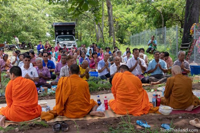 people sitting in front of monks