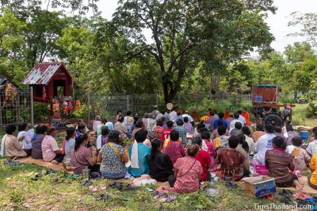 people sitting in front of monks