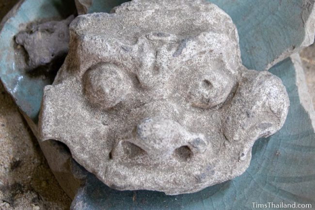 portion of carved face