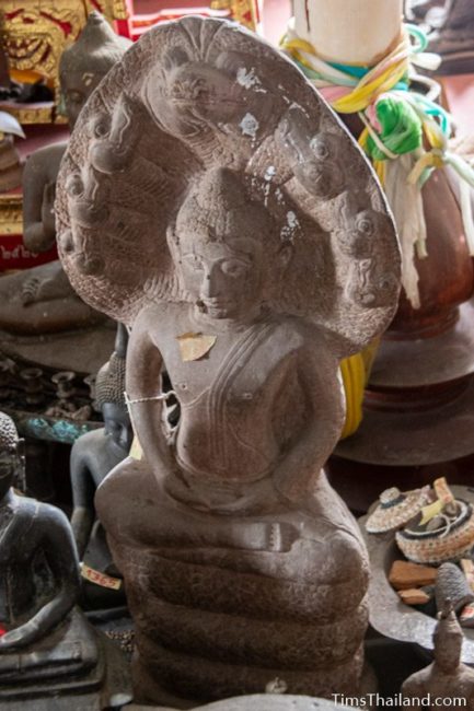 Khmer Buddha on naga statue