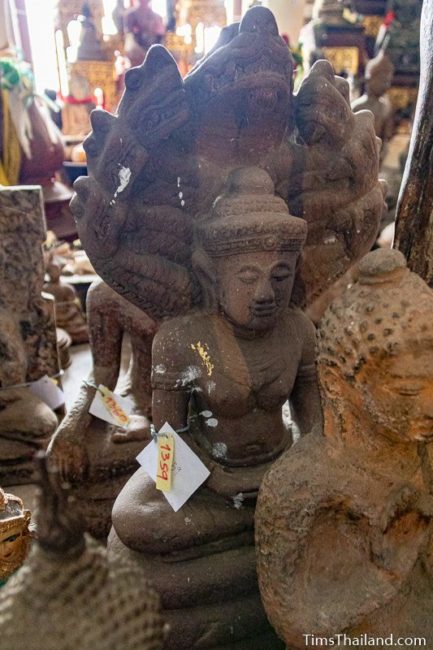 Khmer Buddha on naga statue