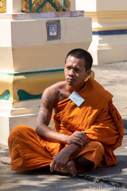 monk sitting on the ground