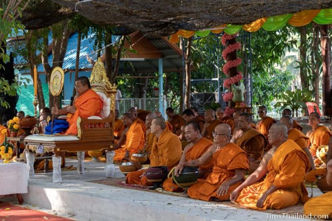 monks listening to a sermon