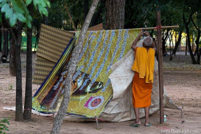 man setting up a tent