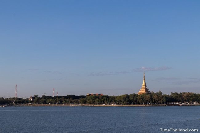 stupa seen from across a lake