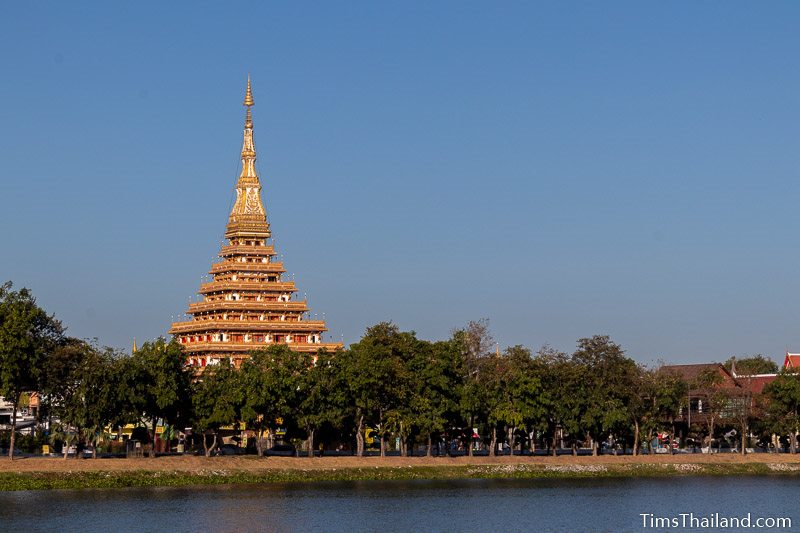 stupa seen from across a lake