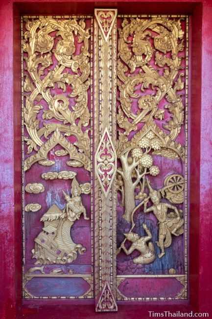 carved wood doors with two Jataka scenes