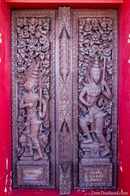 carved wood doors with gods