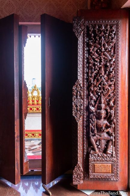 carved wood doors with gods