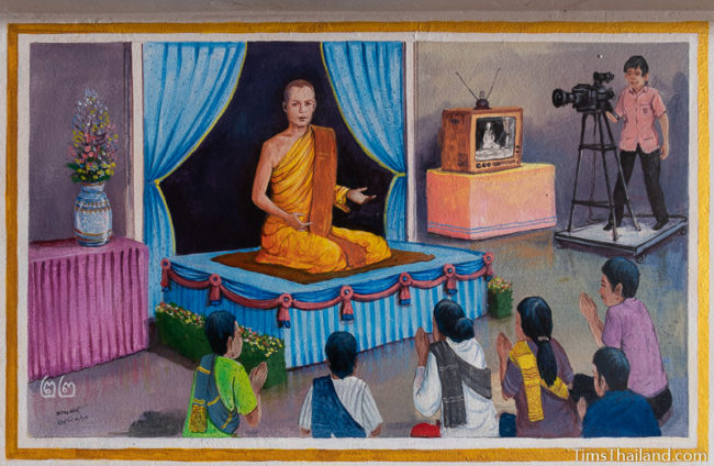 painting of monk on a TV show