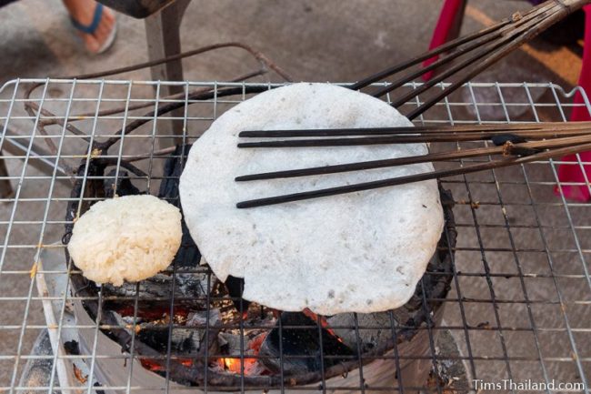 closeup of making khao griap at the temple