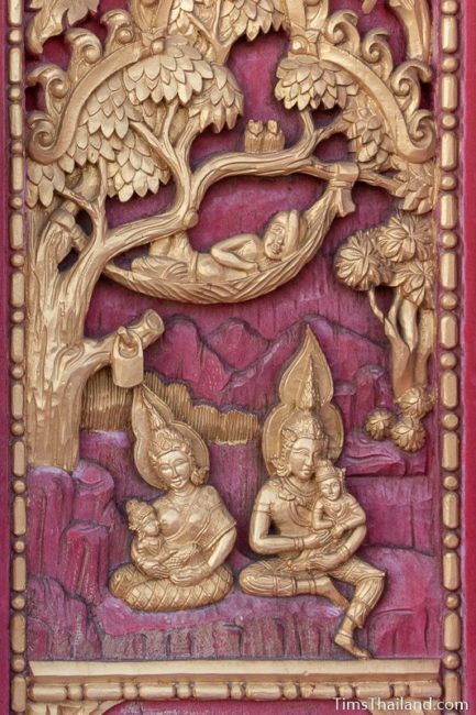 woodcarving of gods caring for kids with old man sleeps in a hammock.