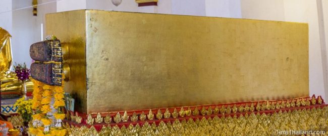 coffin with Buddha's feet sticking out