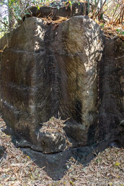 rock wall with cut marks