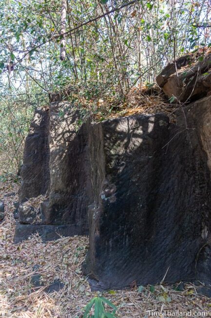 rock wall with cut marks