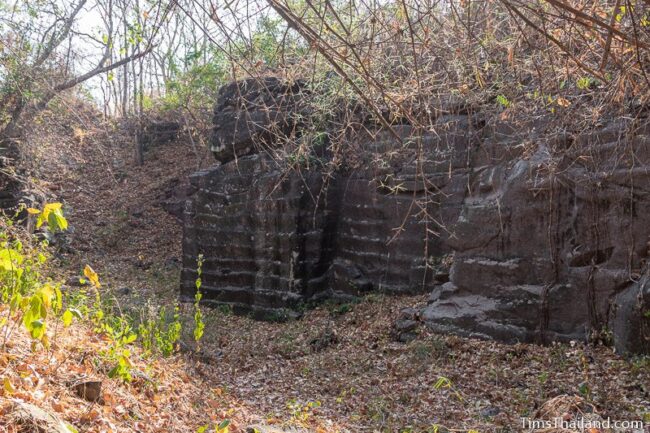 rock wall with cut marks