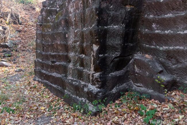 rock wall with cut marks