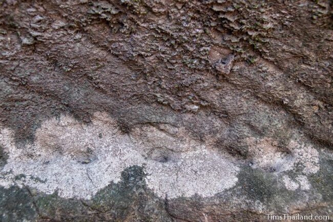 rock wall with cut marks