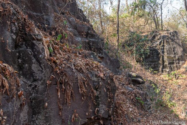 rock wall with cut marks