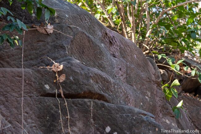 rock wall with cut marks