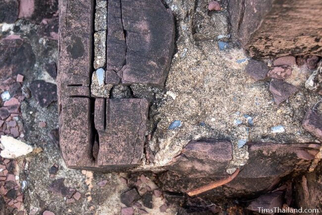 concrete, saw cuts, and metal rod in wall of main sanctuary