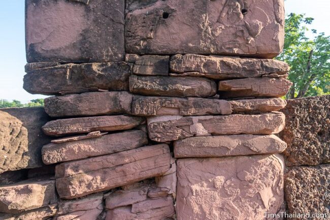 small rocks stacked up to form a wall in main sanctuary