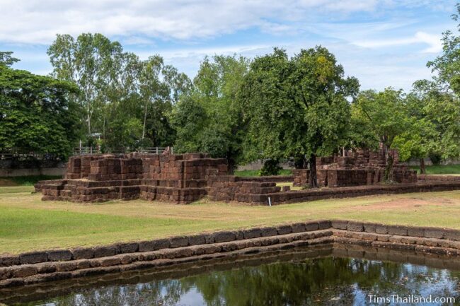 view of temple with sacred pond in the front