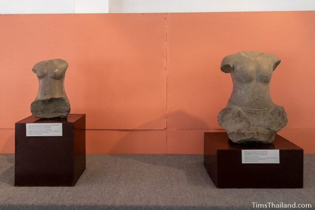 two statues of torsos in Phimai National Museum