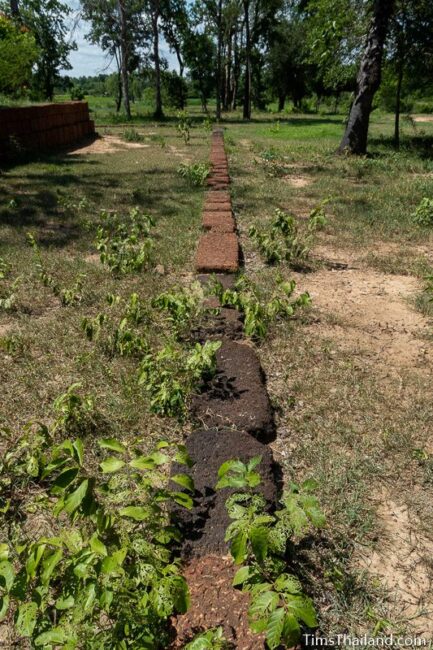 row of new and old laterite blocks