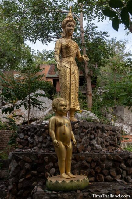 Statues of baby Buddha and his mother