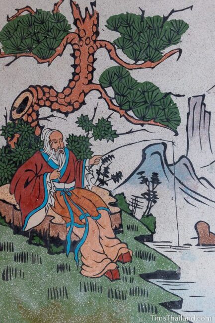 picture of man fishing on wall of Chinese shrine