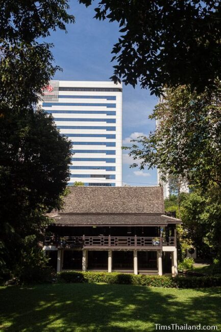 historic museum building with modern skyscraper in background