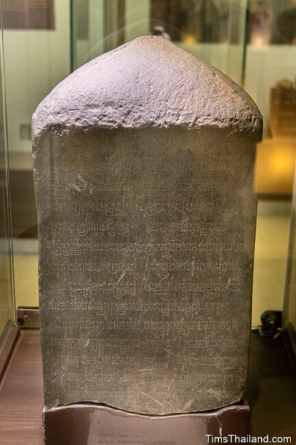 four-sided inscription stone with old text