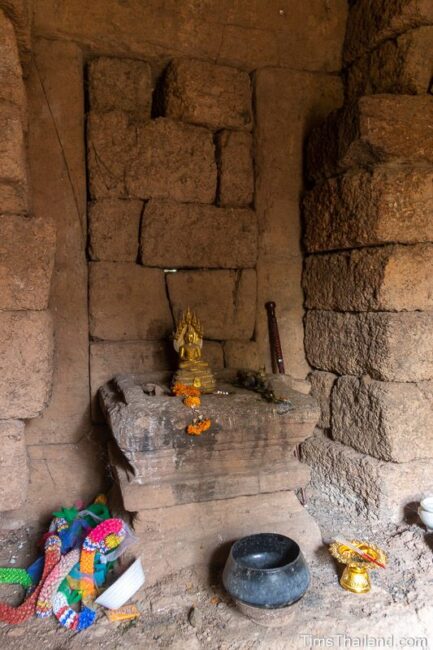 Buddha shrine inside prang