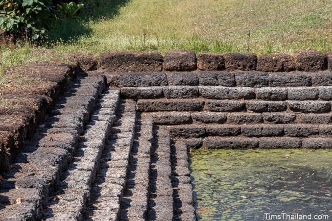 stepped edge of sacred pond