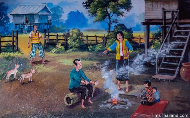 people sitting around a fire