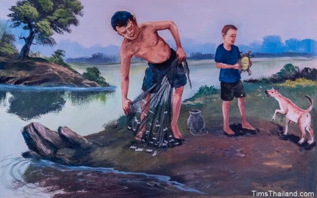 man and boy fishing with a net