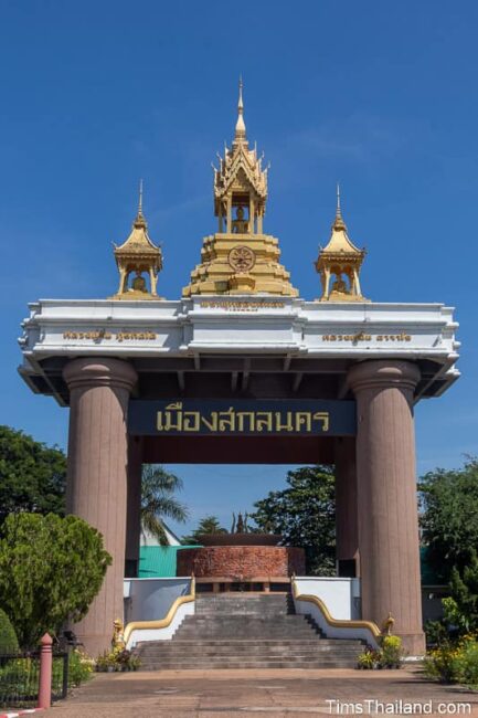 tall symbolic city gate with Buddha on top