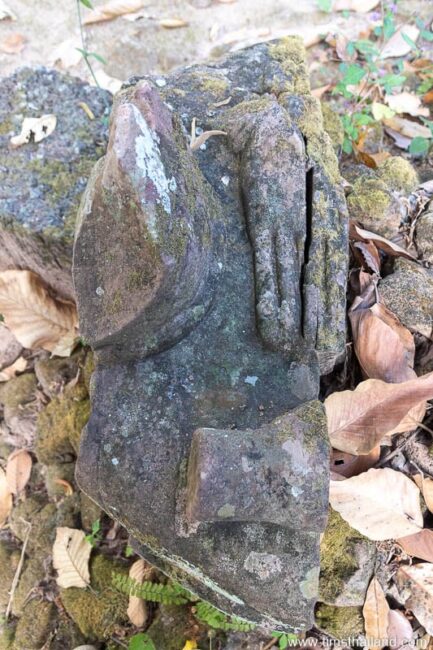 broken buddha sculpture