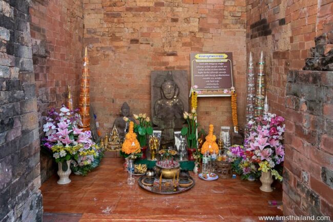 Buddha shrine inside prang