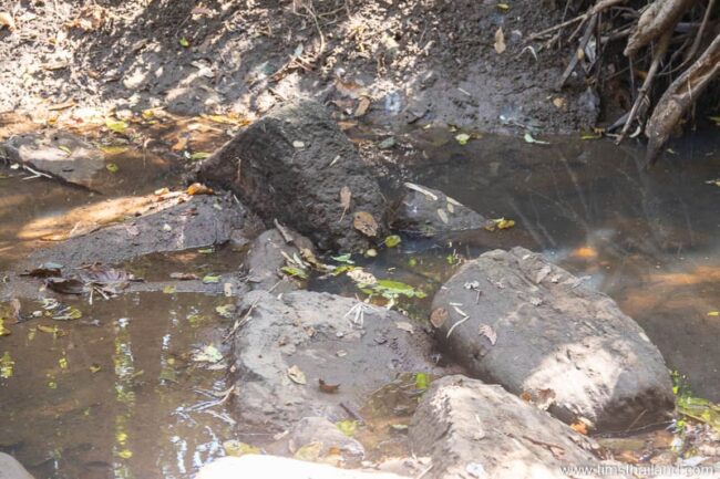 a jumble of blocks in a stream