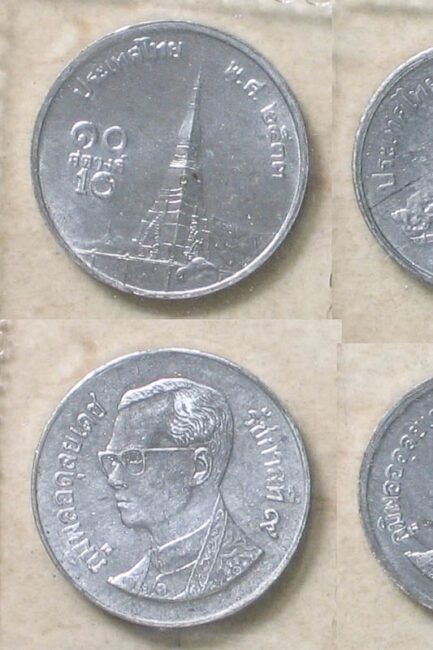 front and back view of 10 satang coin