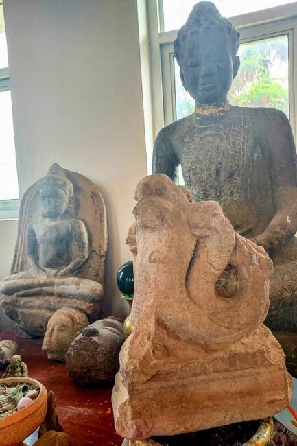 naga antefix and Buddhas