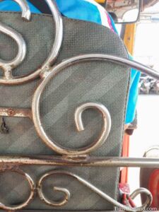 metal decoration on a tuk tuk
