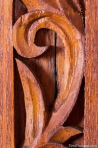 closeup of floral woodcarving on cabinet